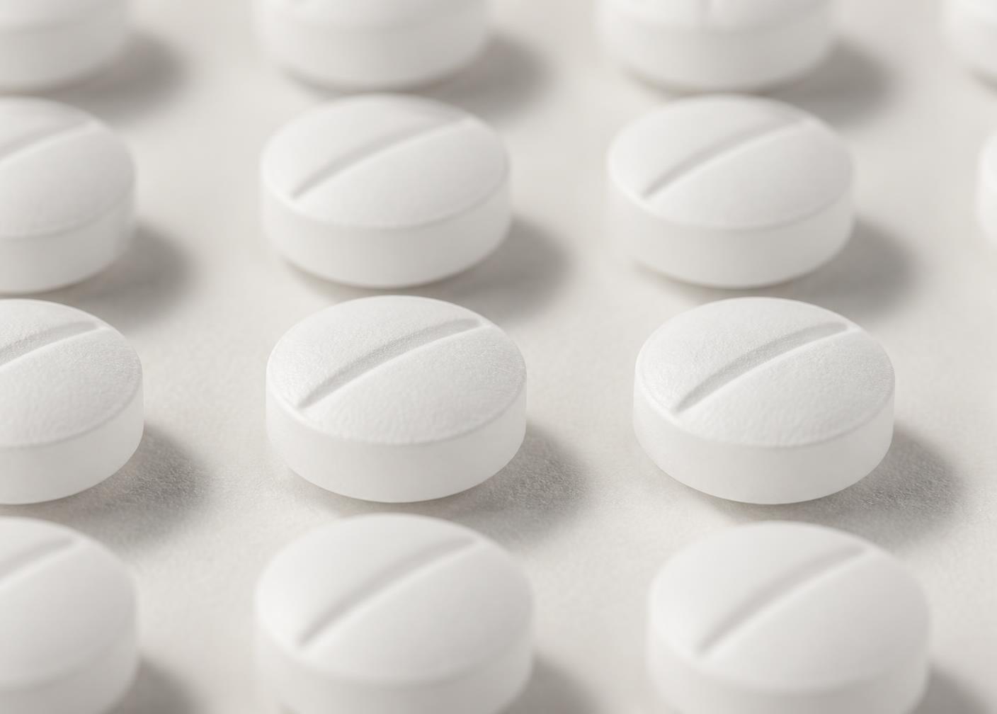 Rows of pharmaceutical tablets in precise formation